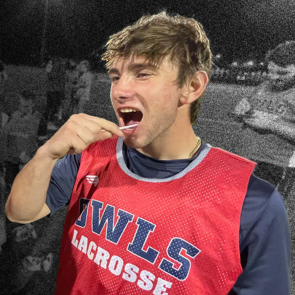 A college lacrosse player swabbing his cheek