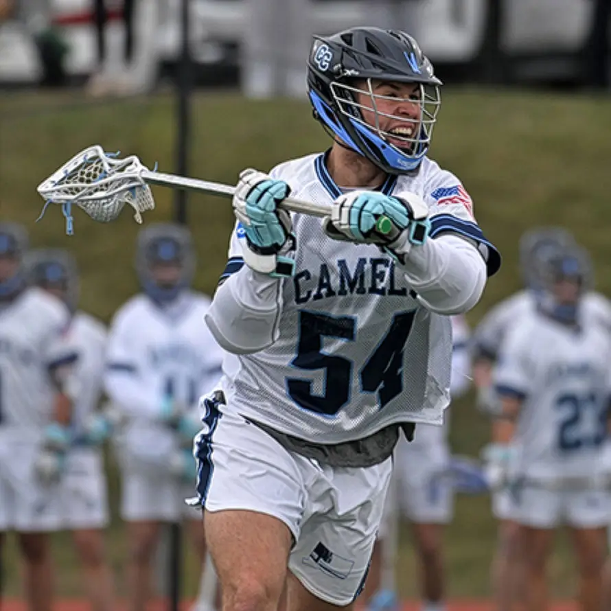 Michael Moran playing lacrosse for Connecticut College