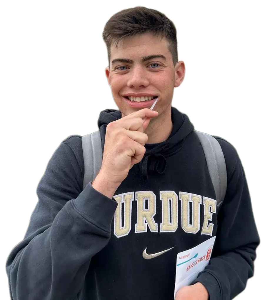 A Purdue student swabbing his cheek to join the registry